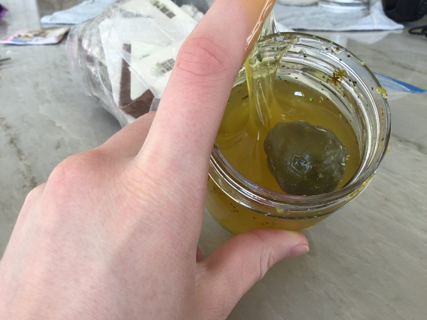 Customer photo review of Shimmery Pickle Clear Slime
