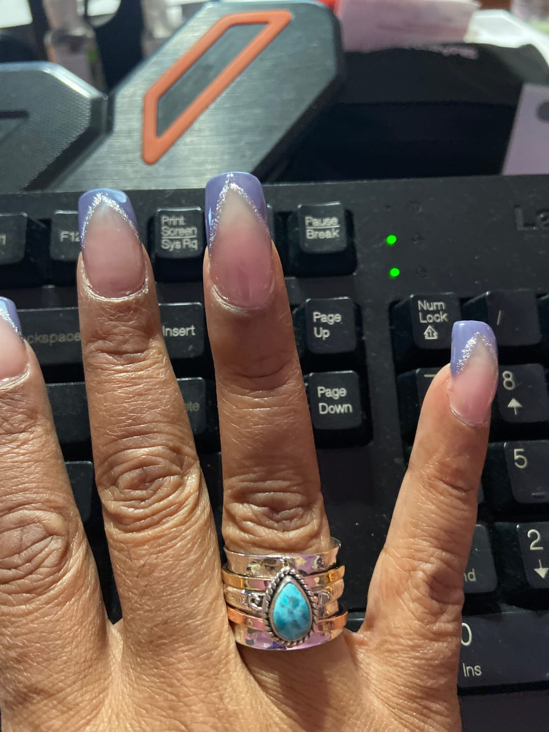 Customer photo review of Teardrop Turquoise Fidget Ring Sterling Silver