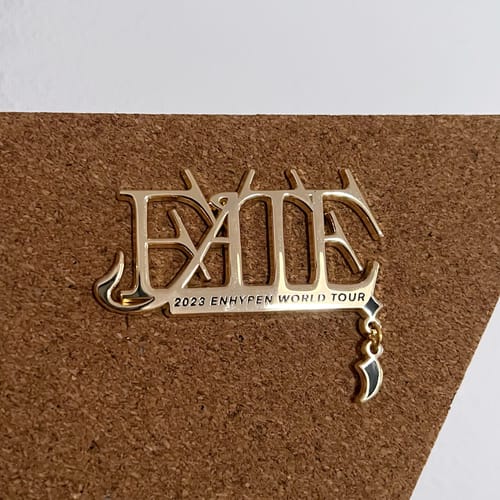 Customer photo review of Enhypen 2023 World Tour Enamel Pins