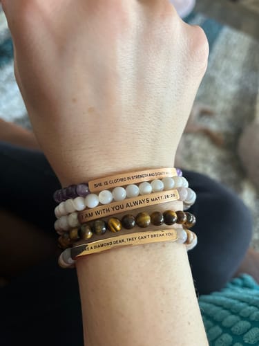 Customer photo review of SHE IS CLOTHED IN STRENGTH AND DIGNITY PROV 31:25 (POS)