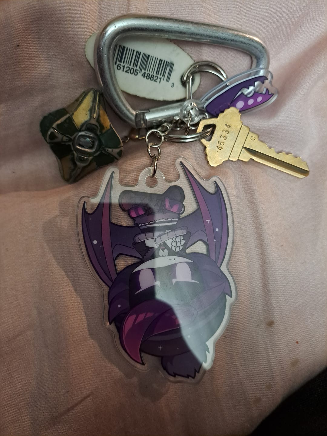 Customer photo review of Uzi Hang Tail Keychain