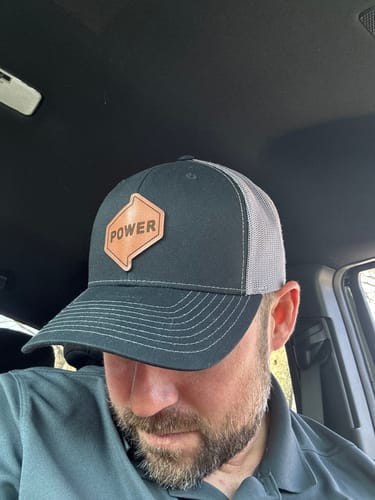 Customer photo review of Custom Leather Patch Trucker Hat - Richardson 112