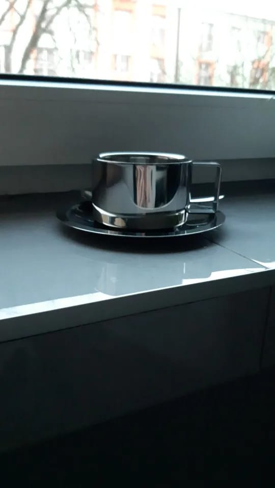 Customer photo review of Italian Style Steel Latte Coffee Cup With Saucer & Spoon