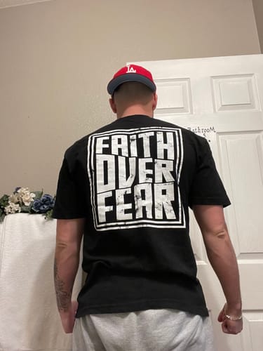 Customer photo review of Faith Over Fear Tee