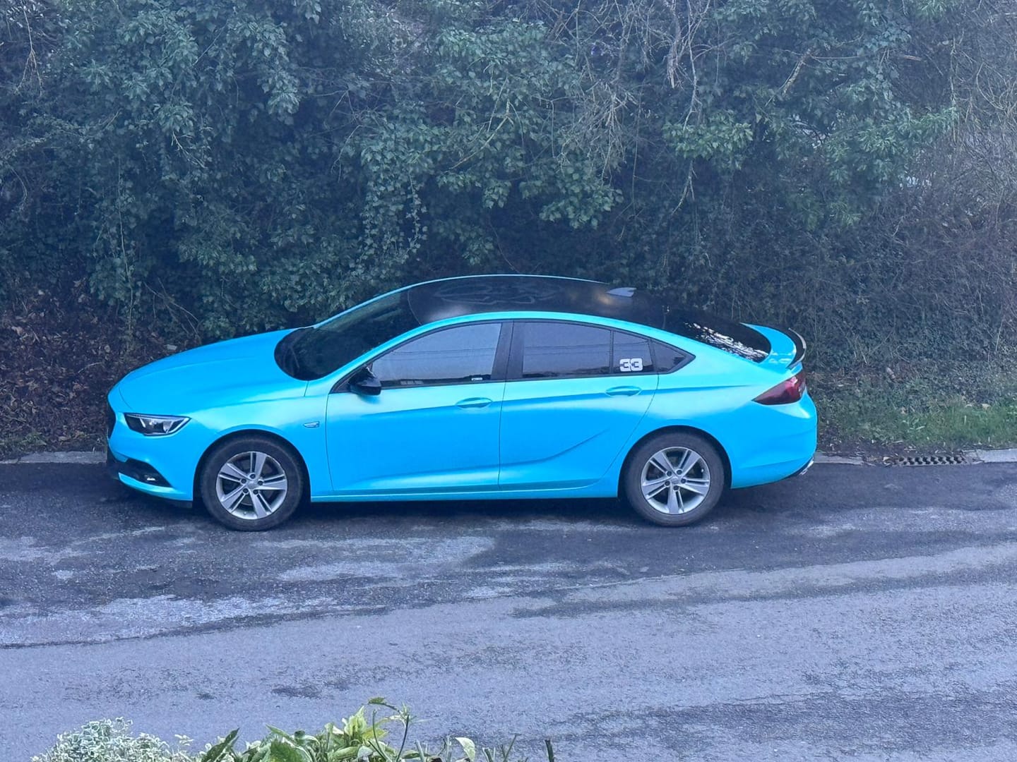Customer photo review of Candy Metallic Neon Ice Blue Vinyl Wrap