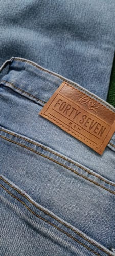 Customer photo review of Skinny Mid Rise Jeans (Light Blue)