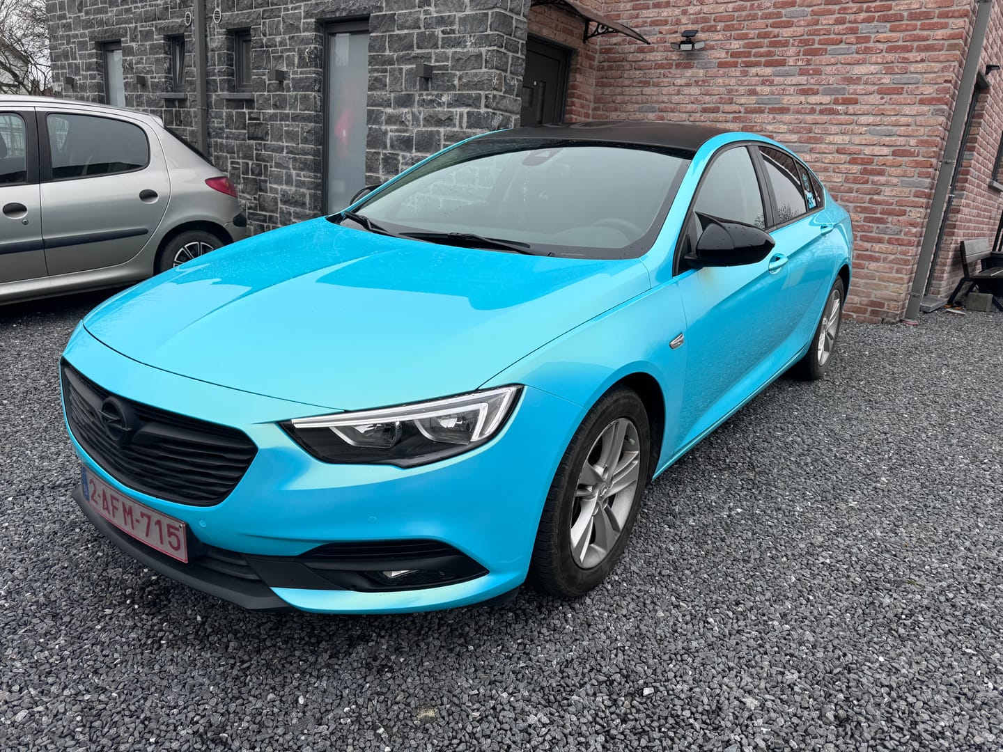 Customer photo review of Candy Metallic Neon Ice Blue Vinyl Wrap