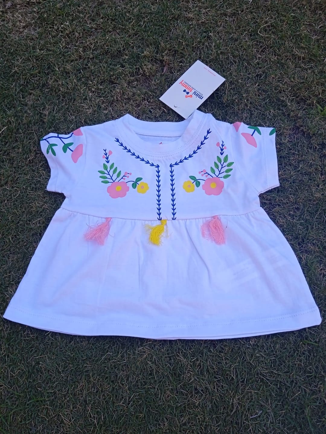 Customer photo review of Girls Soft Cotton Graphic White Frock