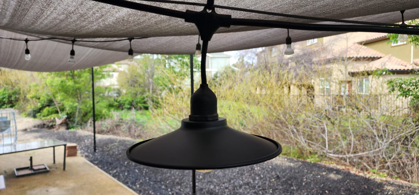 Customer photo review of Classic Metal Patio Light Bulb Shade Cover for Outdoor Commercial String Lights, E26, Black