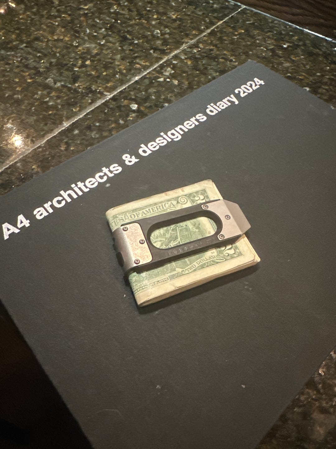Customer photo review of MC02 TITANIUM MONEY CLIP