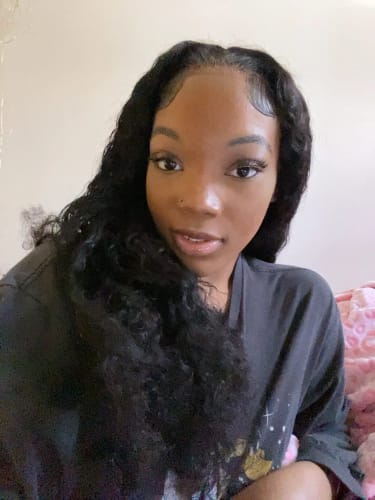 Customer photo review of Wear Go 5x5 Pre Cut Lace Closure Wig Bouncy Water Wave Glueless Wig 150%/180% Density