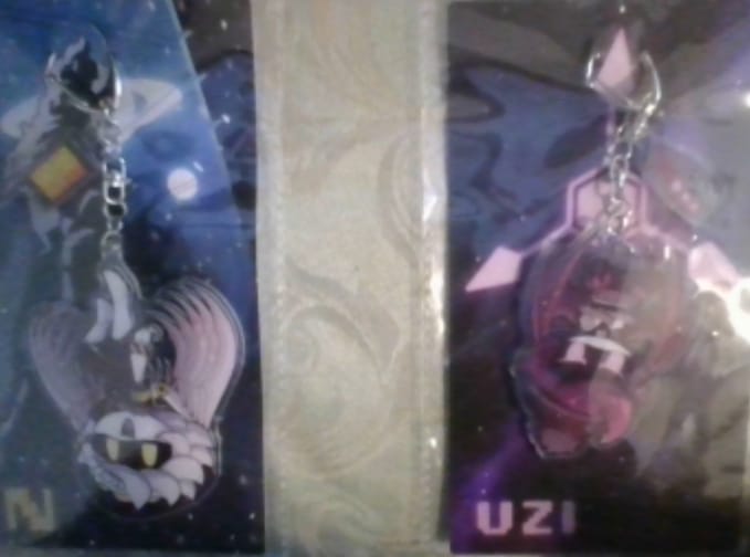 Customer photo review of Uzi Hang Tail Keychain