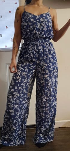 Customer photo review of WOMEN'S SLEEVELESS SMOCK WAIST FLORAL JUMPSUIT