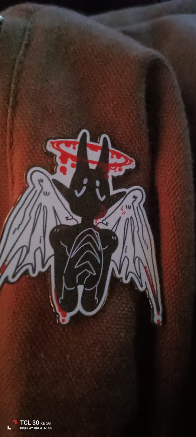 Customer photo review of Gore Angel Enamel Pins