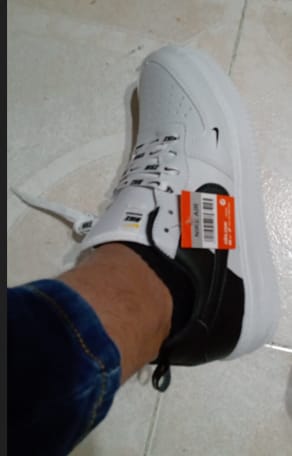 Customer photo review of Tenis 285 Blanco Negro