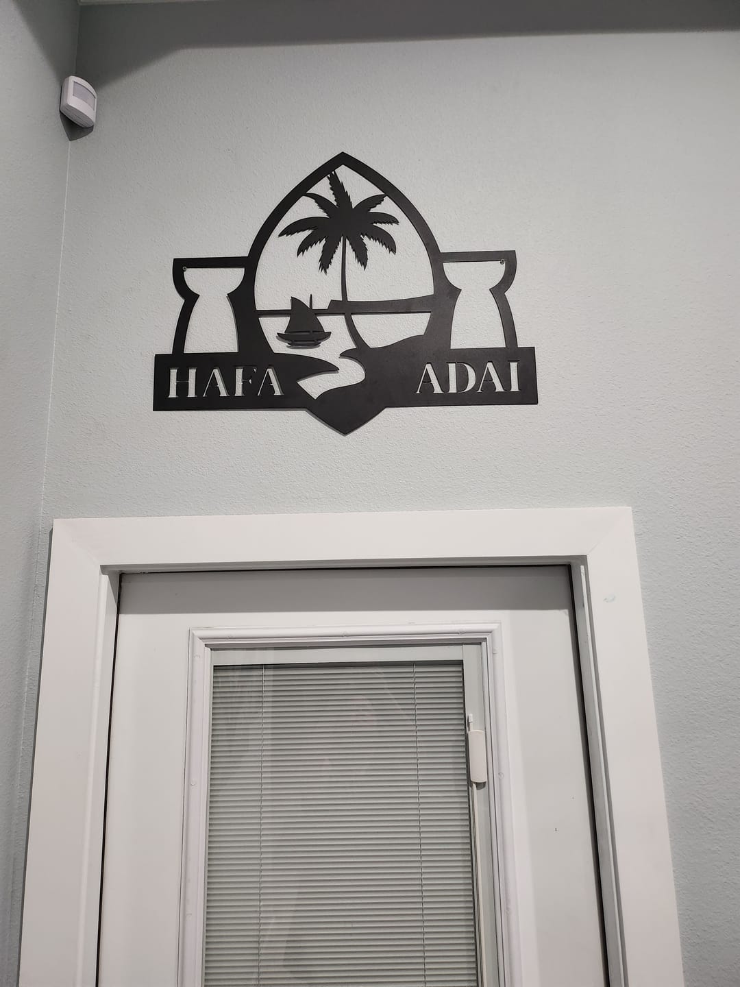 Customer photo review of Hafa Adai Guam Seal Latte Stone Metal Wall Decor Sign