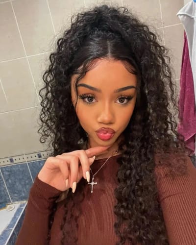 Customer photo review of Wear Go 5x5 Pre Cut Lace Closure Wig Bouncy Water Wave Glueless Wig 150%/180% Density