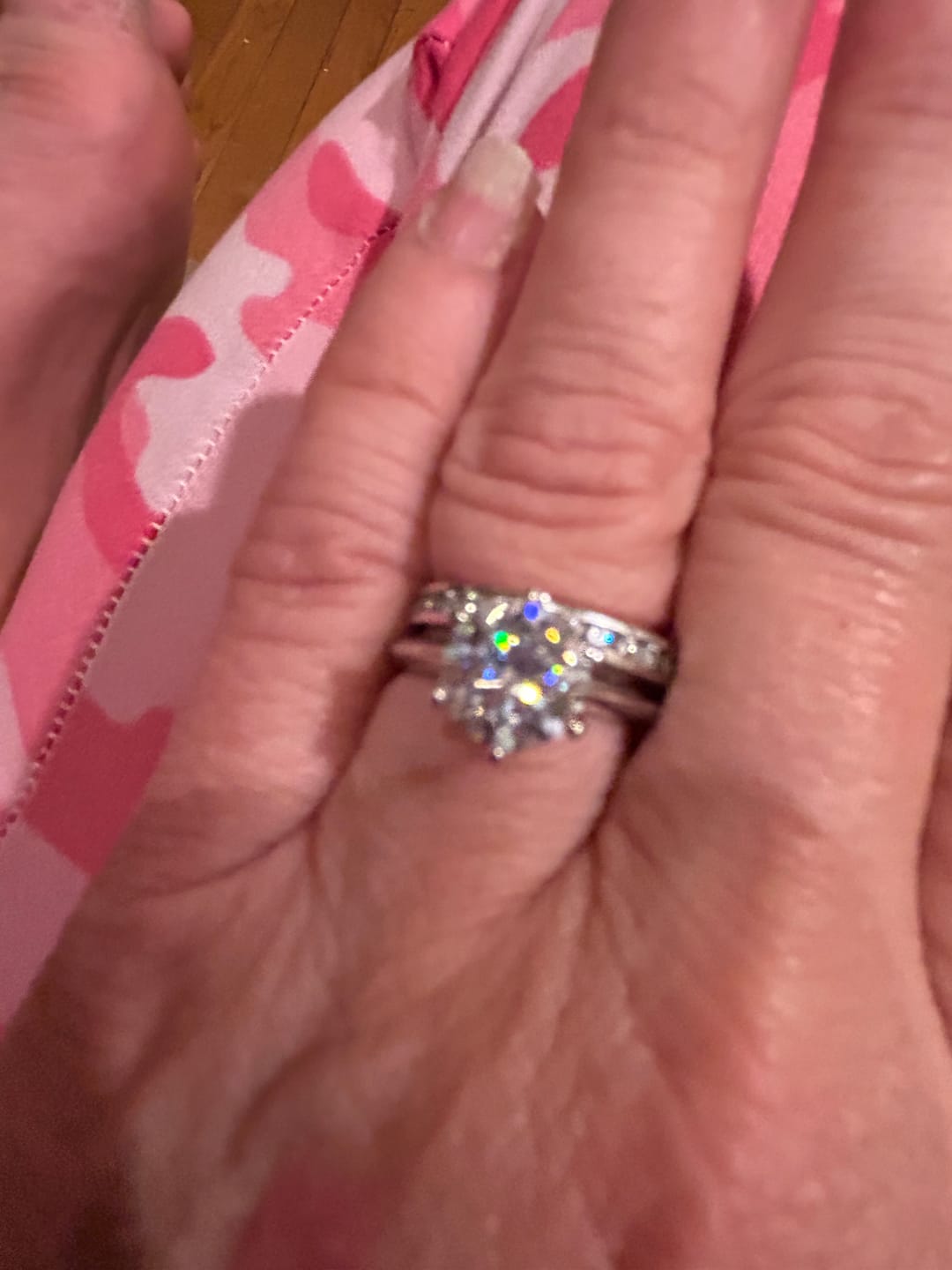 Customer photo review of Classic Solitaire Moissanite Six-Prong Sterling Silver Engagement Ring