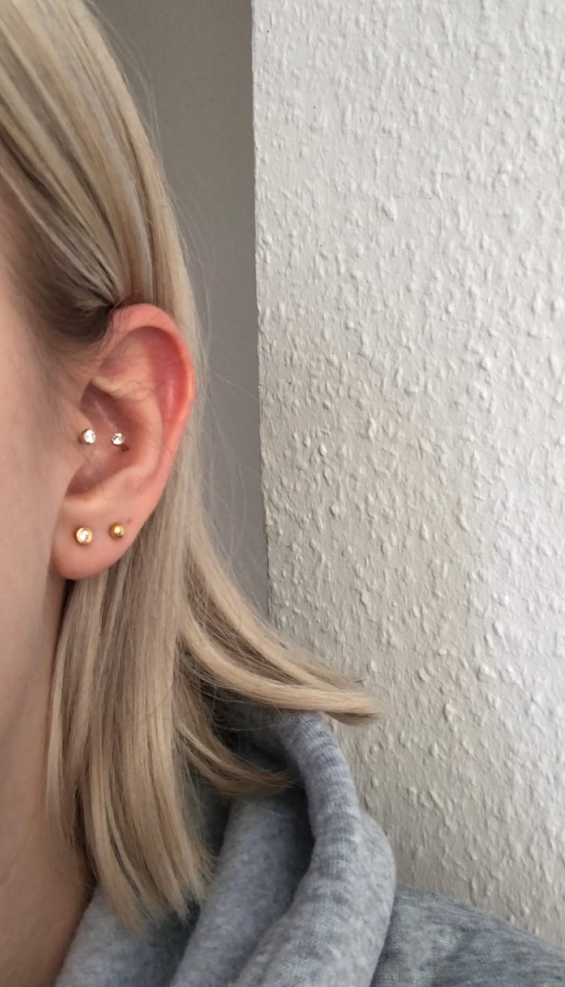 Customer photo review of Shining Point Piercing | Titan