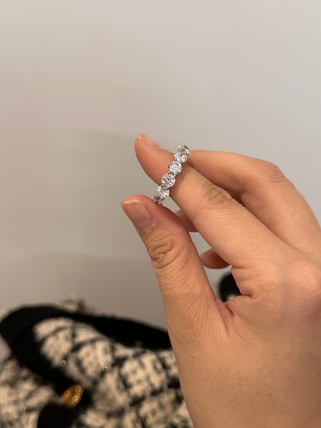 Customer photo review of Louily Classic Eternity Round Cut Women's Wedding Band In Sterling Silver