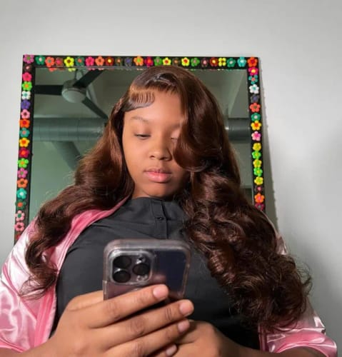 Customer photo review of #4 Dark Brown Body Wave Wig 13x4 HD Lace Front Colored Human Hair Wigs