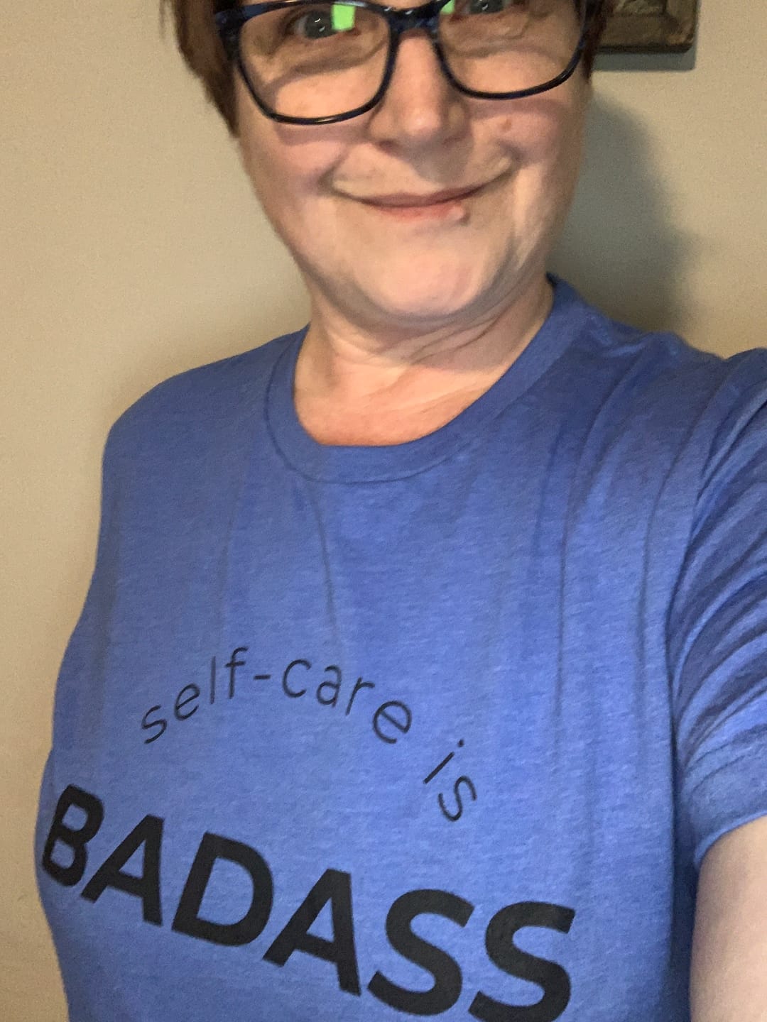 Customer photo review of Self-Care Is Badass T-Shirt