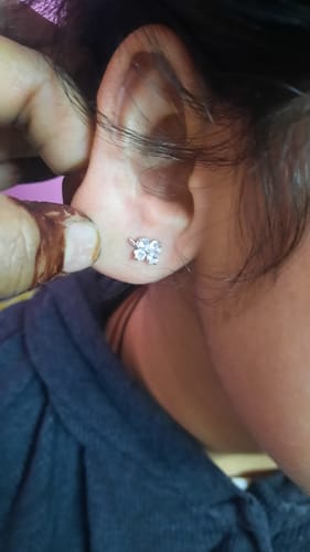 Customer photo review of Silver Flower Clover Studs