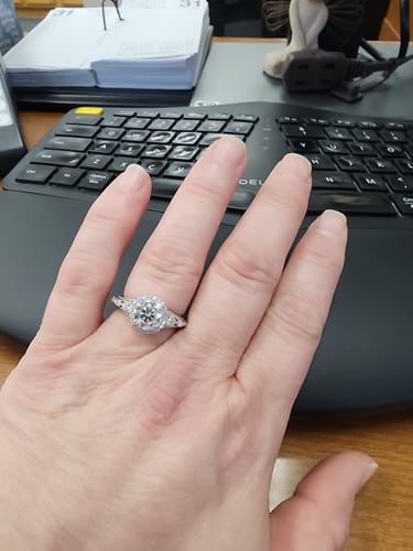 Terri J. review of Halo Round Moissanite With Pear Side Stones Pave Engagement Ring image 1 out of 1