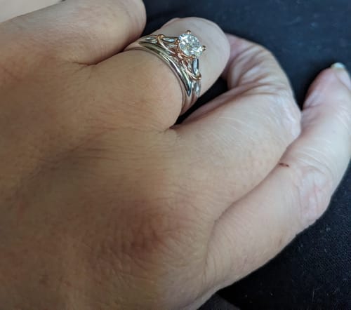 Customer photo review of Solitaire Moissanite Two Tone Twisted Sterling Silver Ring