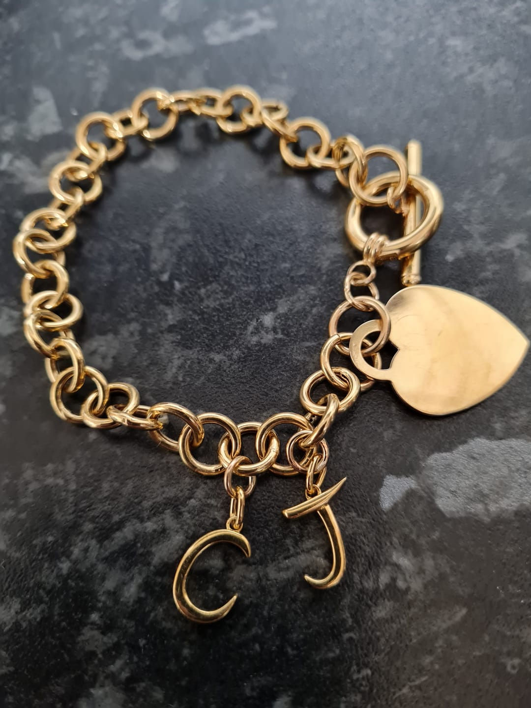 Customer photo review of Molto Initial Charm Pendants