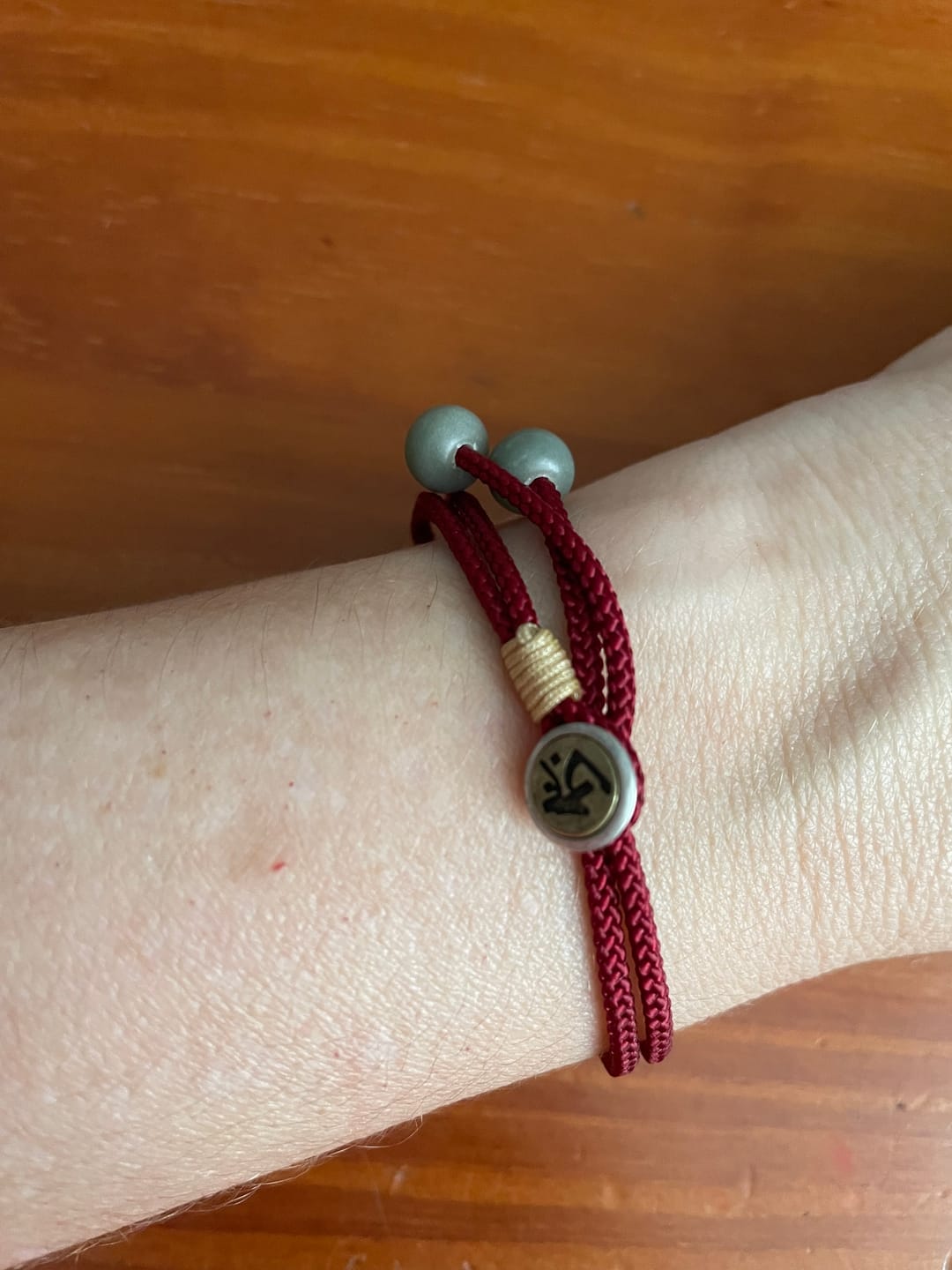Customer photo review of Pulseira Tibetana da Proteção