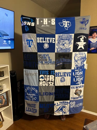 T-shirt quilt featuring lions by Ryan from TX