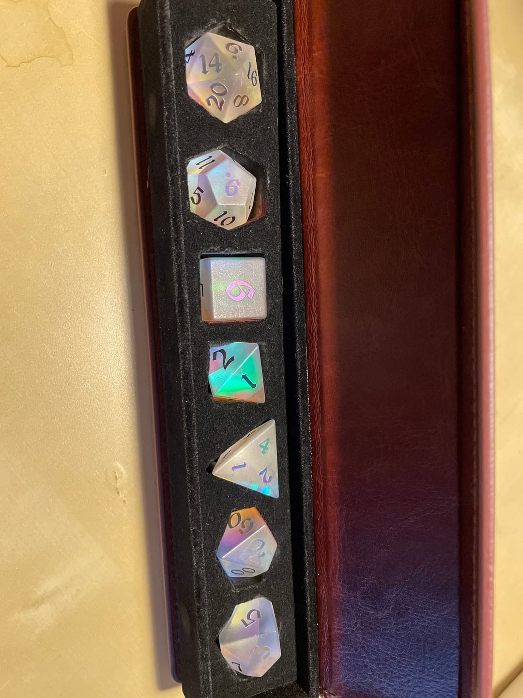 Customer photo review of Gemstone (Inked) Raised Dichroic Glass Polyhedral Dice (With Box) DND Set
