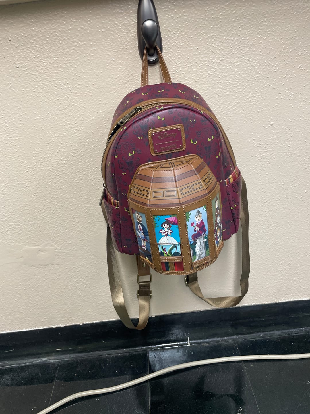 Customer photo review of Loungefly Disney Haunted Mansion Moving Portraits Mini Backpack