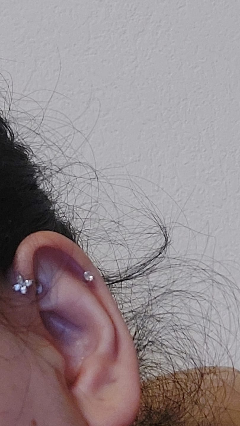 Customer photo review of Butterfly Piercing | Titan