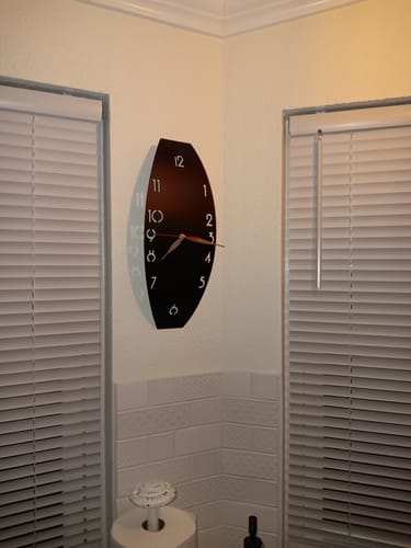 Customer photo review of Metal Clock | 3D Minimalist Numbered Vertical Wall Art Timepiece