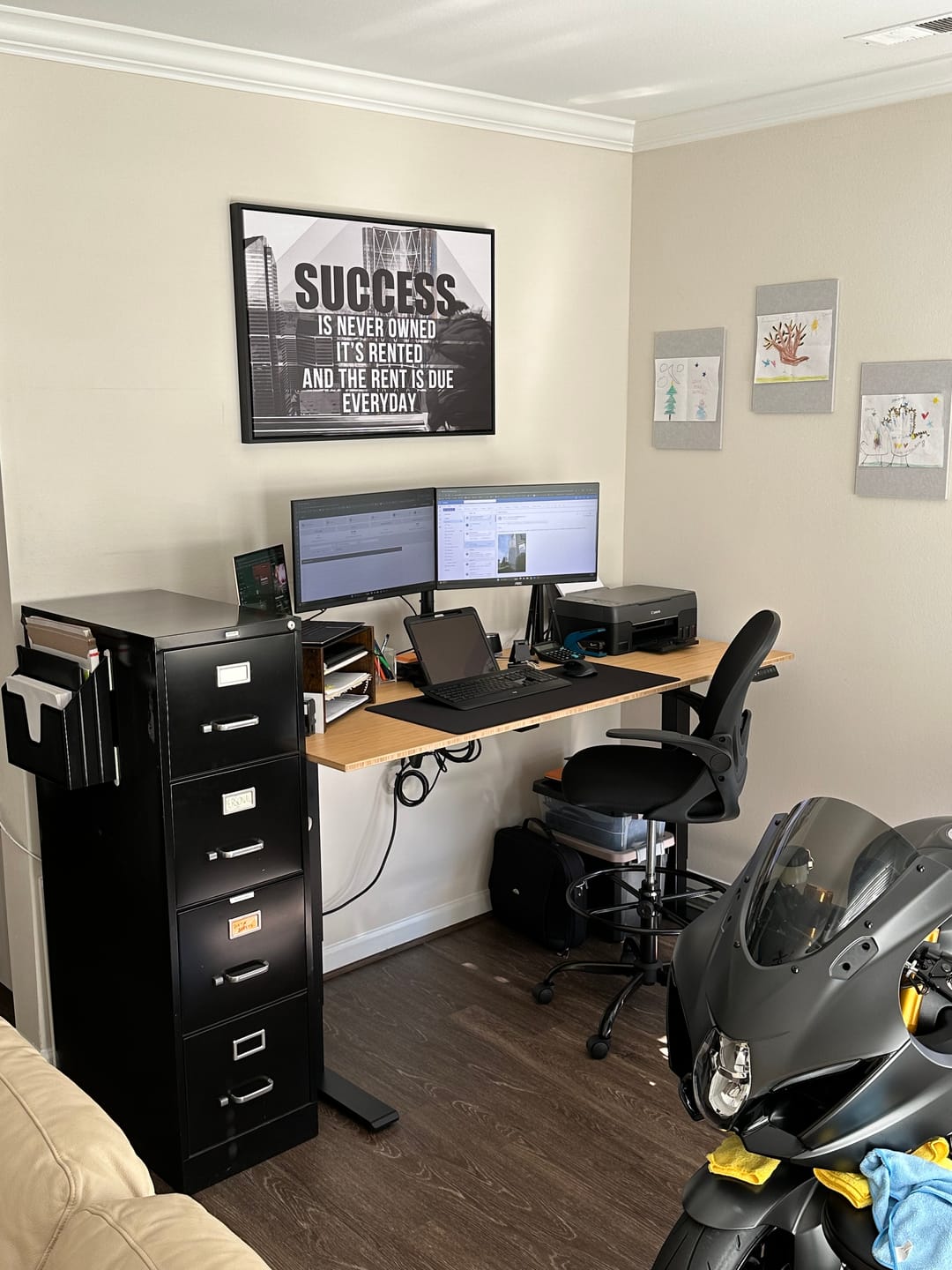 Customer photo review of Success Is Never Owned, It's Rented And The Rent Is Due Every Day Motivational Canvas Wall Art, B&W Version