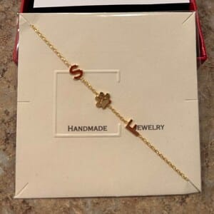 Customer photo review of Sideways Paw Letter Necklace