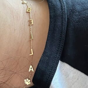 Customer photo review of Sideways Paw Letter Necklace
