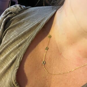Customer photo review of Sideways Paw Letter Necklace