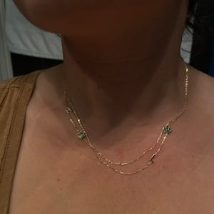 Customer photo review of Sideways Paw Letter Necklace