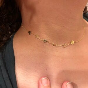 Customer photo review of Sideways Paw Letter Necklace