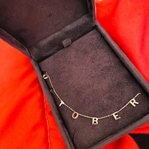 Customer photo review of 14K Solid Gold Letter Necklace