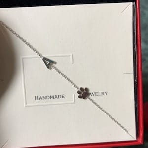 Customer photo review of Sideways Paw Letter Necklace