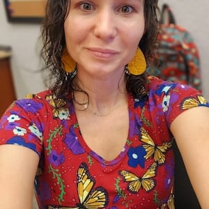 Customer photo review of Sideways Paw Letter Necklace