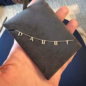 Customer photo review of 14K Solid Gold Letter Necklace