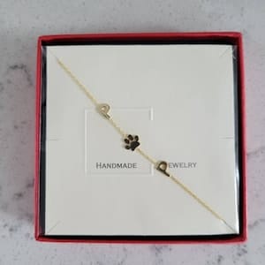 Customer photo review of Sideways Paw Letter Necklace