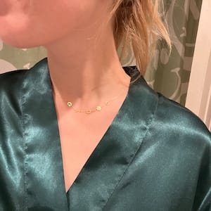 Customer photo review of Sideways Paw Letter Necklace