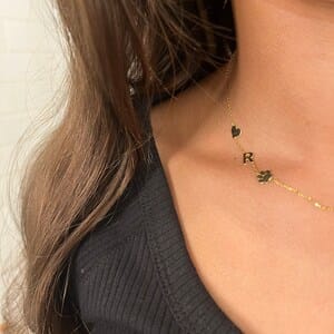 Customer photo review of Sideways Paw Letter Necklace
