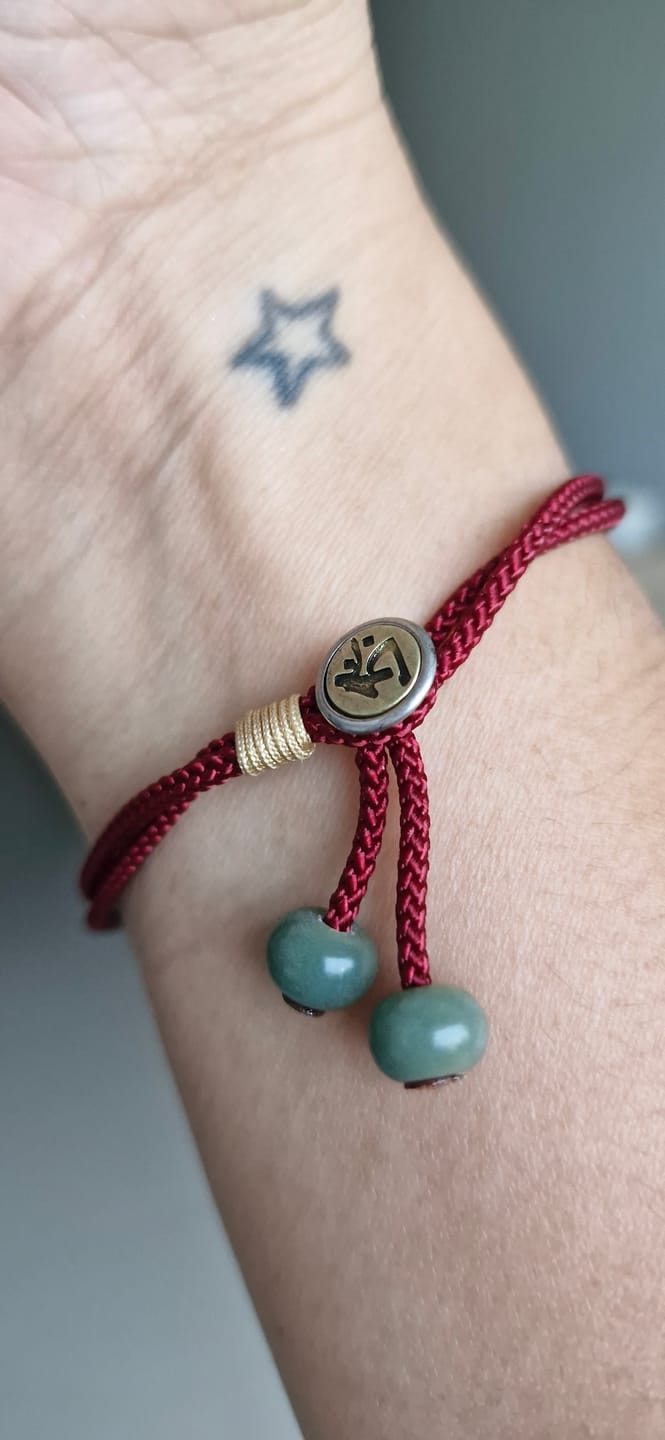 Customer photo review of Pulseira Tibetana da Proteção